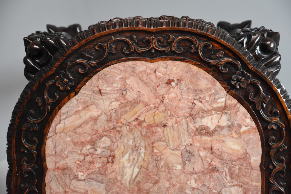 Late 19th century Chinese hardwood circular pot stand or low table  View IX