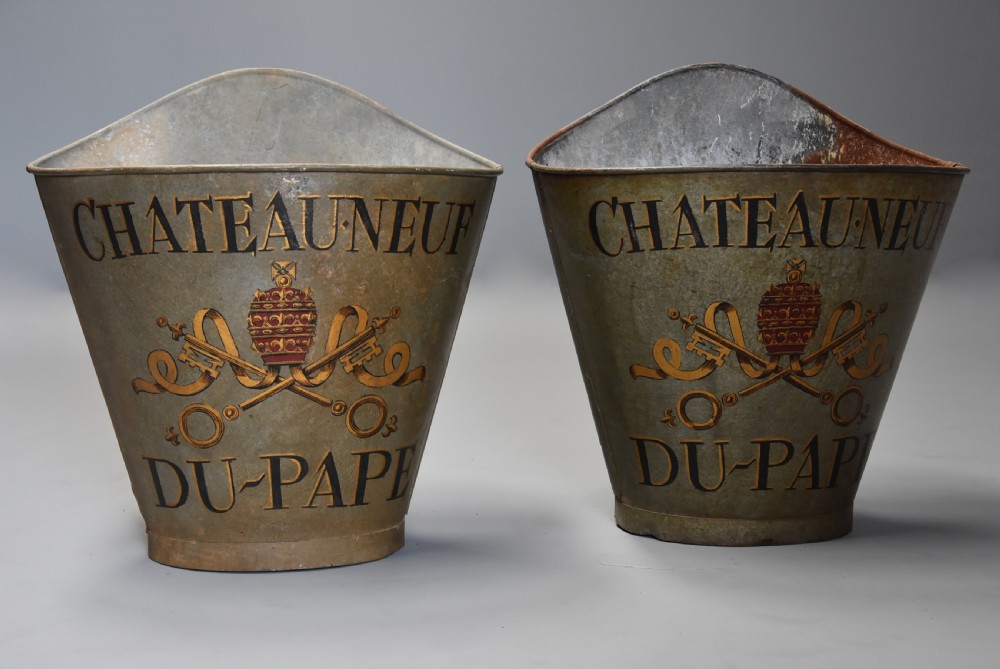 Highly decorative pair of galvanised metal grape carriers with painted decoration