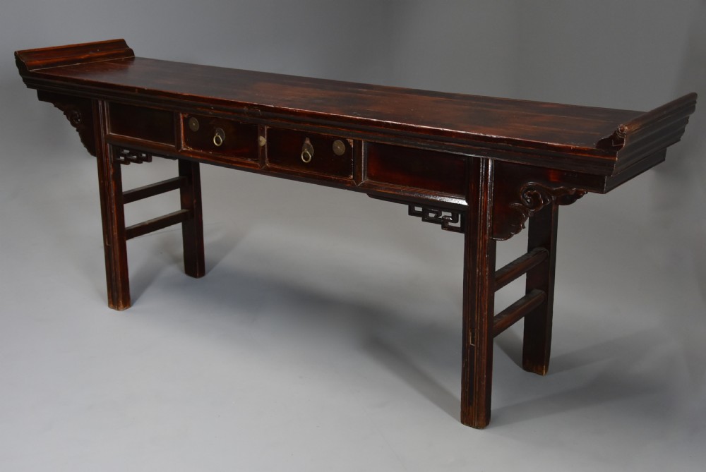 Late 19thc Chinese elm two drawer side table of large proportions View III