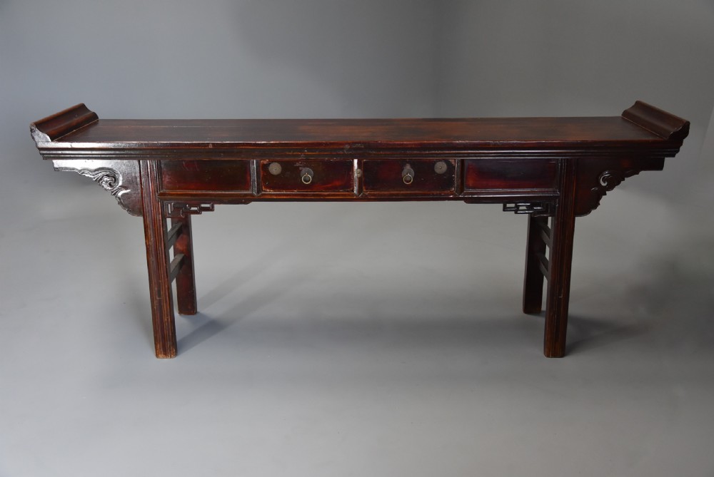 Late 19thc Chinese elm two drawer side table of large proportions View IV
