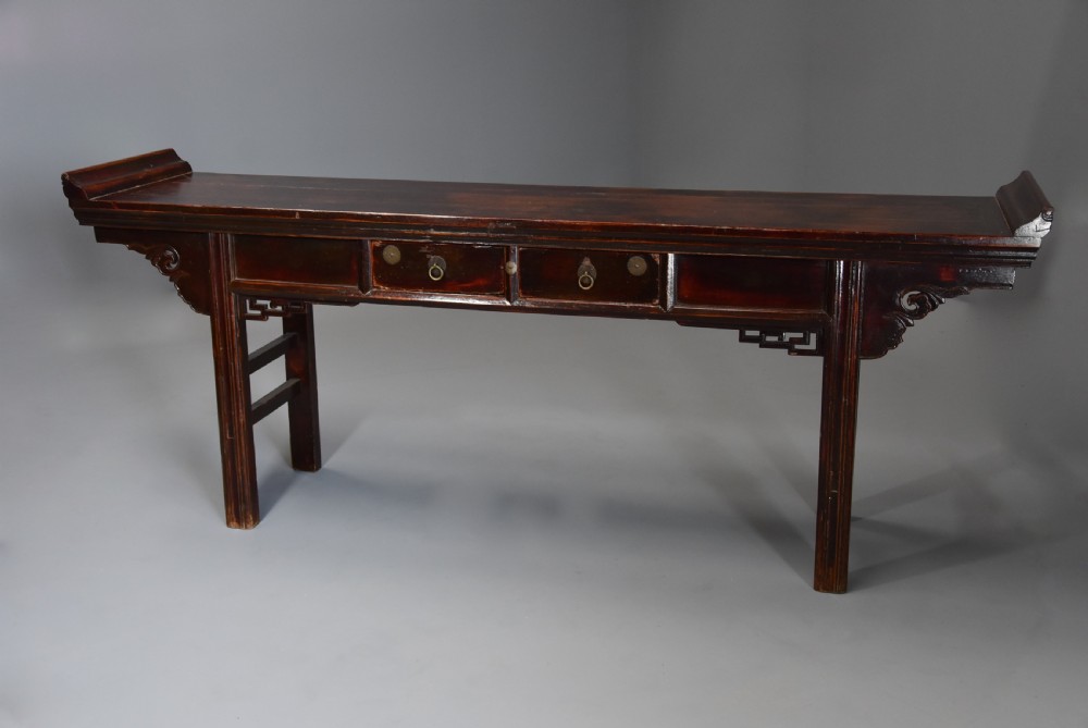 Late 19thc Chinese elm two drawer side table of large proportions View V