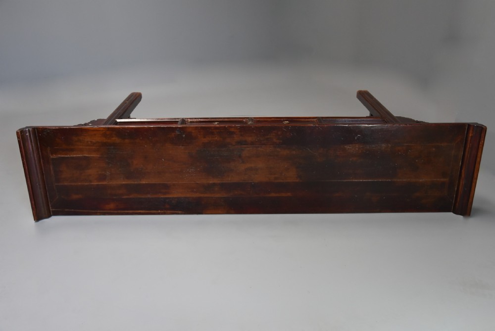 Late 19thc Chinese elm two drawer side table of large proportions View X