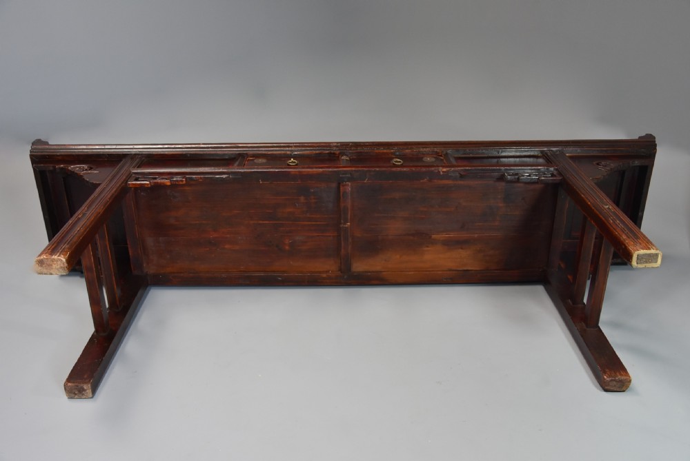 Late 19thc Chinese elm two drawer side table of large proportions View XI