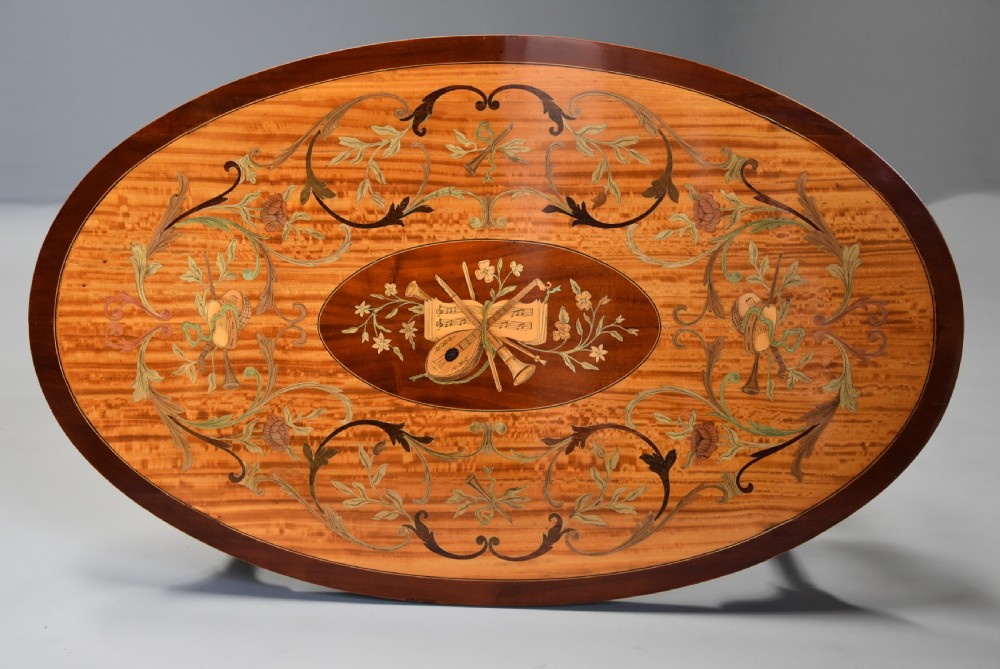 Superbly fine quality Edwardian inlaid satinwood 2 tier coffee table of oval form View II