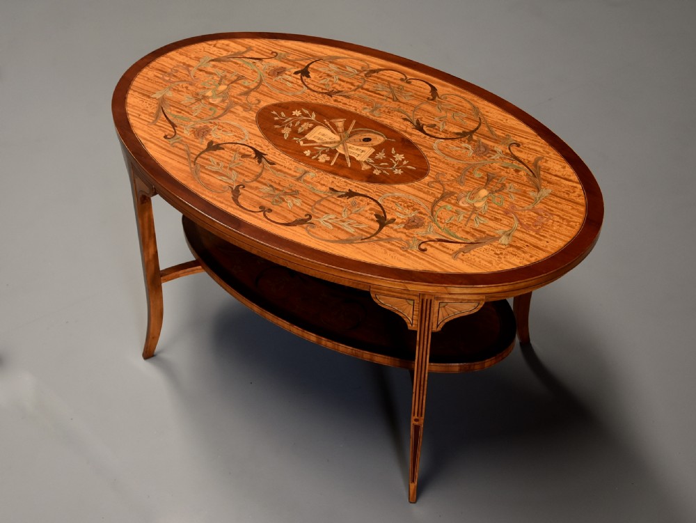 Superbly fine quality Edwardian inlaid satinwood 2 tier coffee table of oval form View V