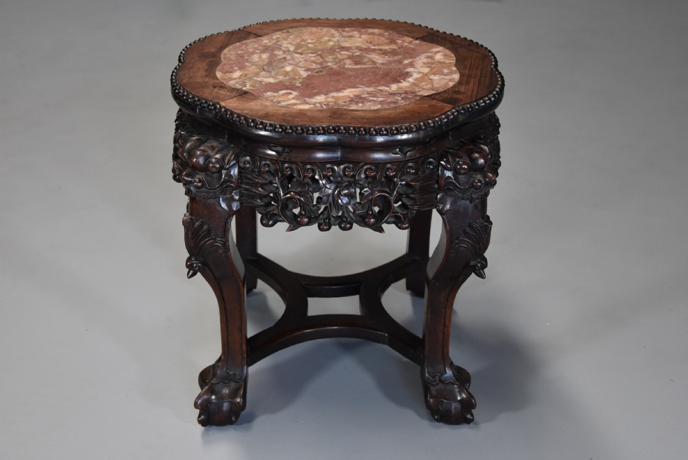 Late 19th century Chinese hardwood pot stand with shaped marble inset top View II
