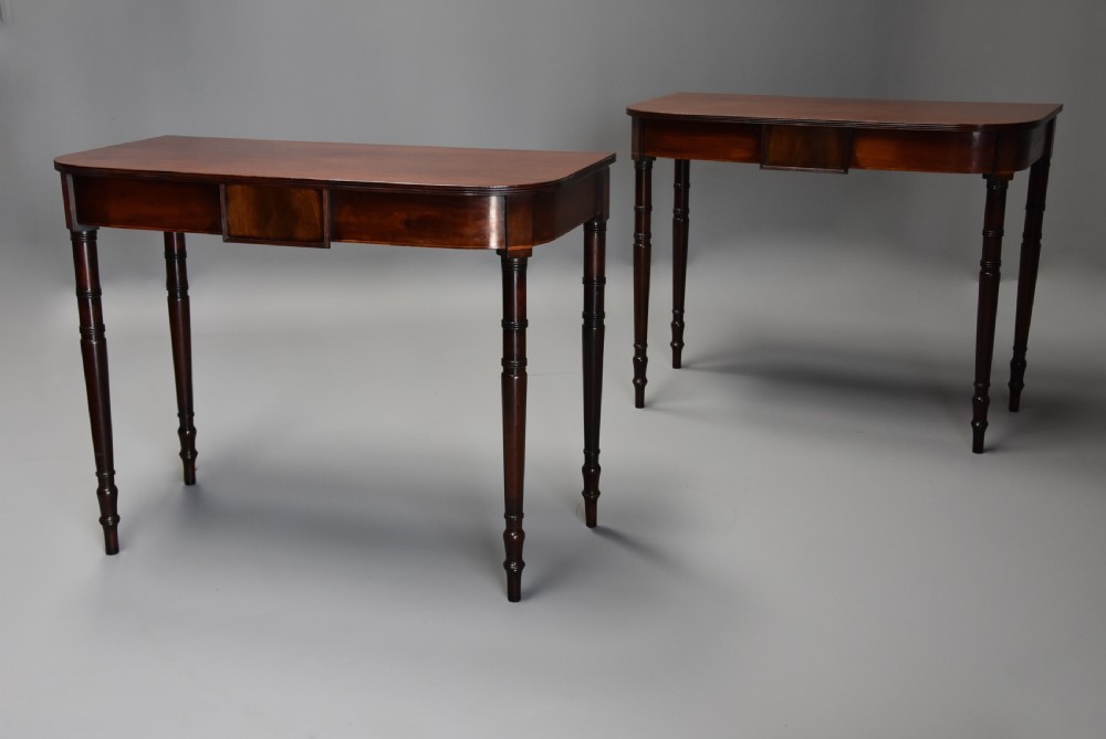 Pair of early 19th century mahogany console tables