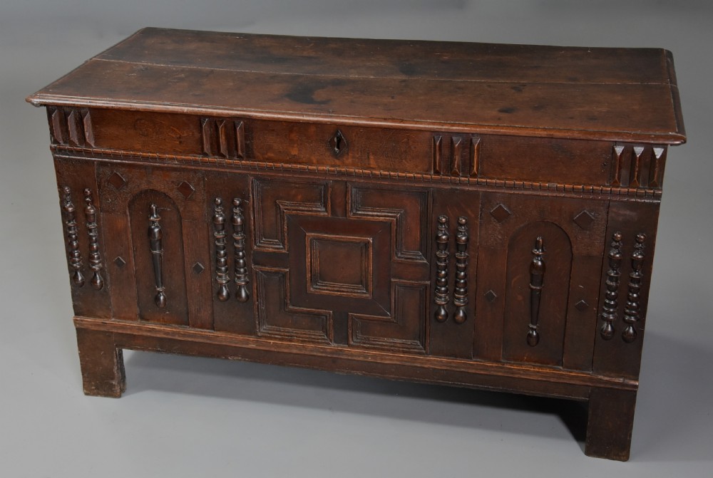 Rare mid-late 17th century oak moulded front coffer with fine patina