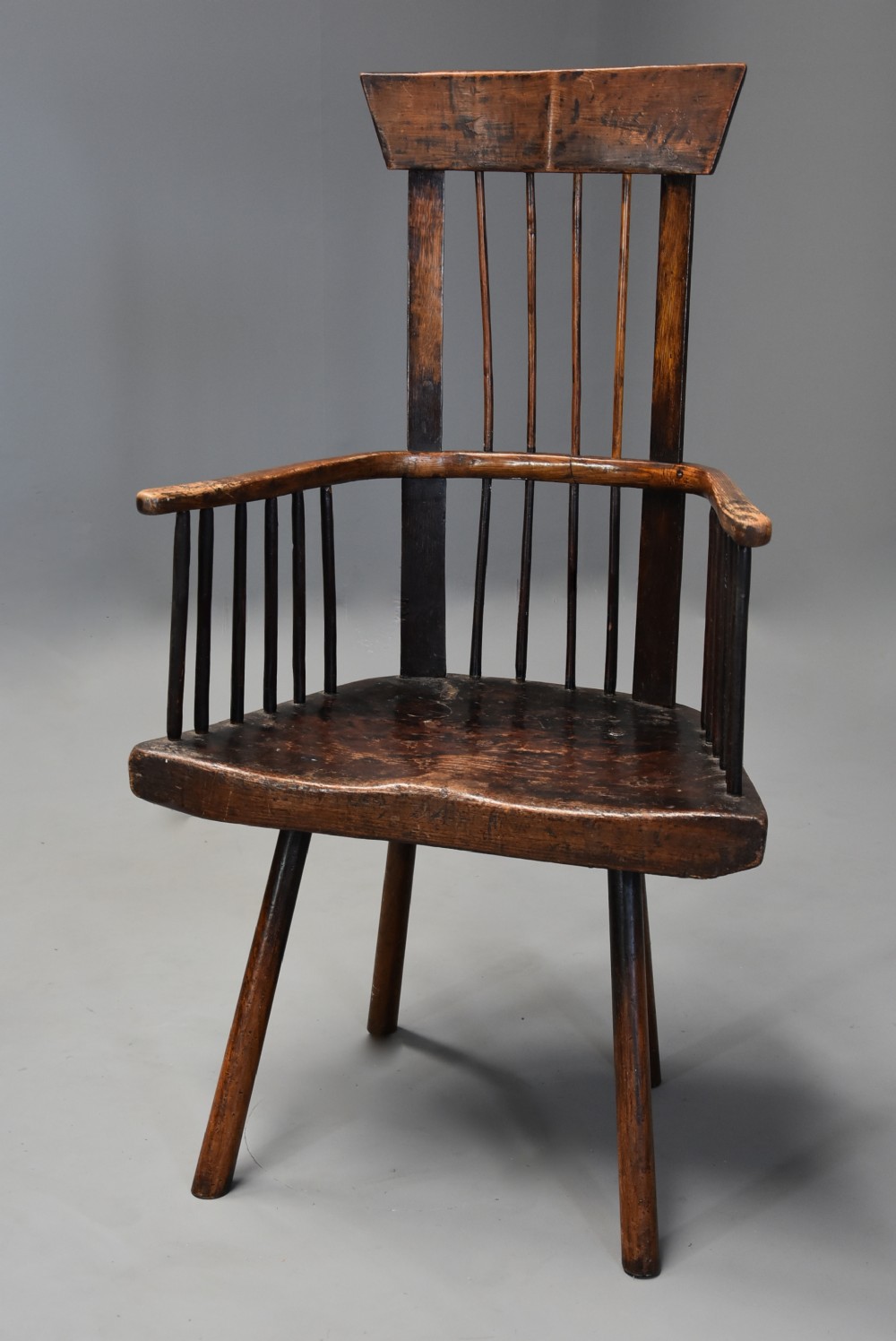 19th century Welsh primitive ash & elm comb back armchair with good patina