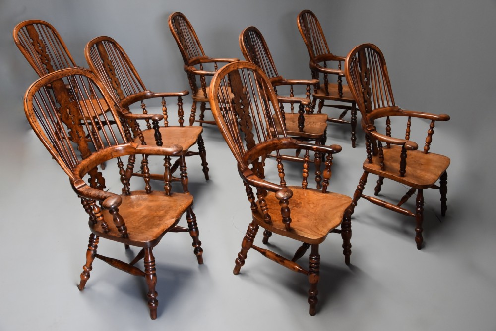 Superb rare set of eight 19th century burr yew broad arm high back Windsor armchairs of superb patina View III
