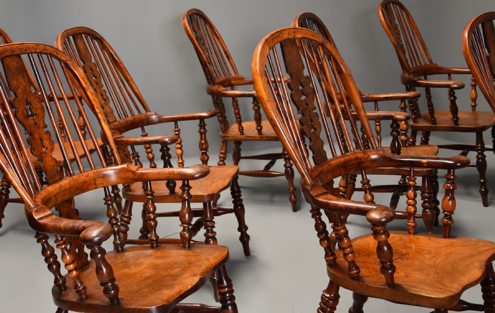 Superb rare set of eight 19th century burr yew broad arm high back Windsor armchairs of superb patina View IV