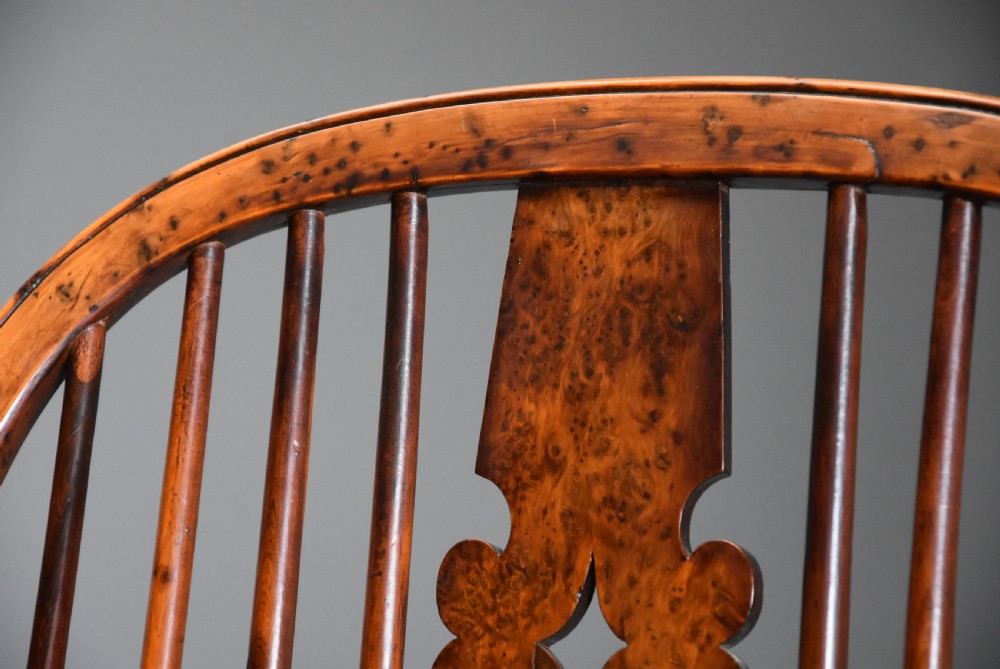 Superb rare set of eight 19th century burr yew broad arm high back Windsor armchairs of superb patina View VIII