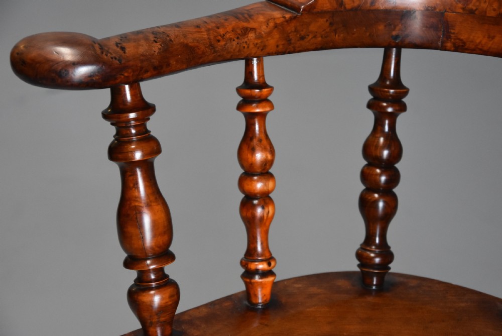 Superb rare set of eight 19th century burr yew broad arm high back Windsor armchairs of superb patina View XI