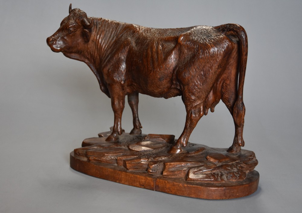 Finely carved late 19thc linden wood Black Forest cow, possibly by The Huggler family View V