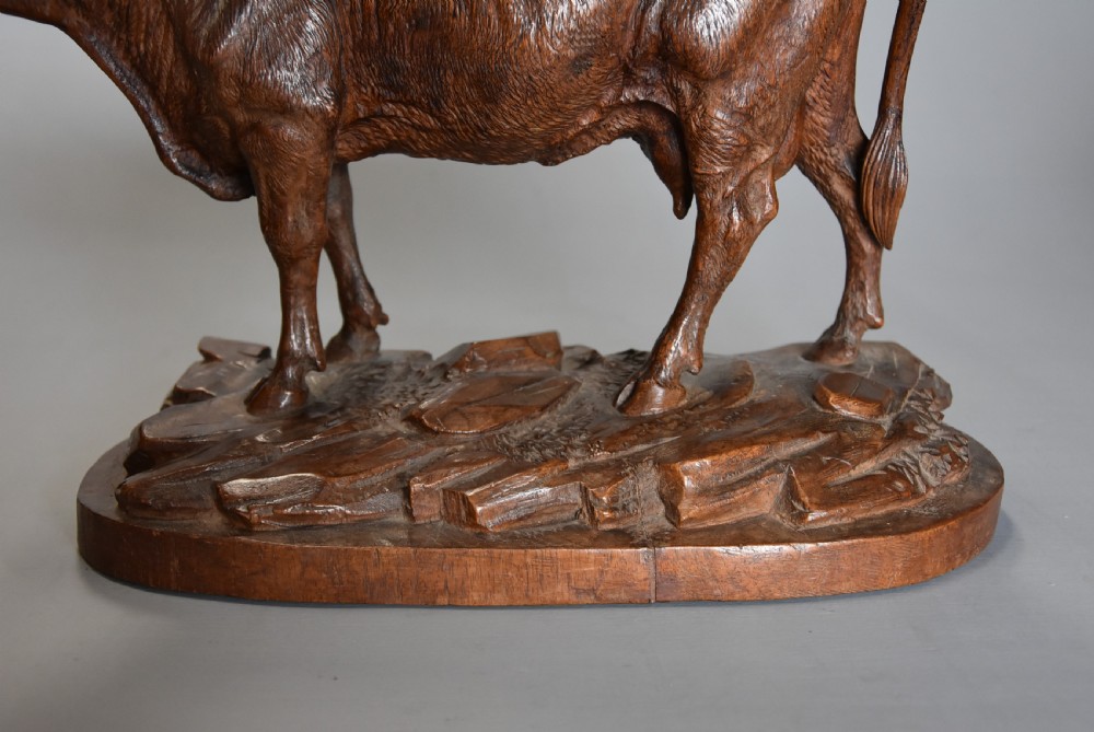 Finely carved late 19thc linden wood Black Forest cow, possibly by The Huggler family View VIII