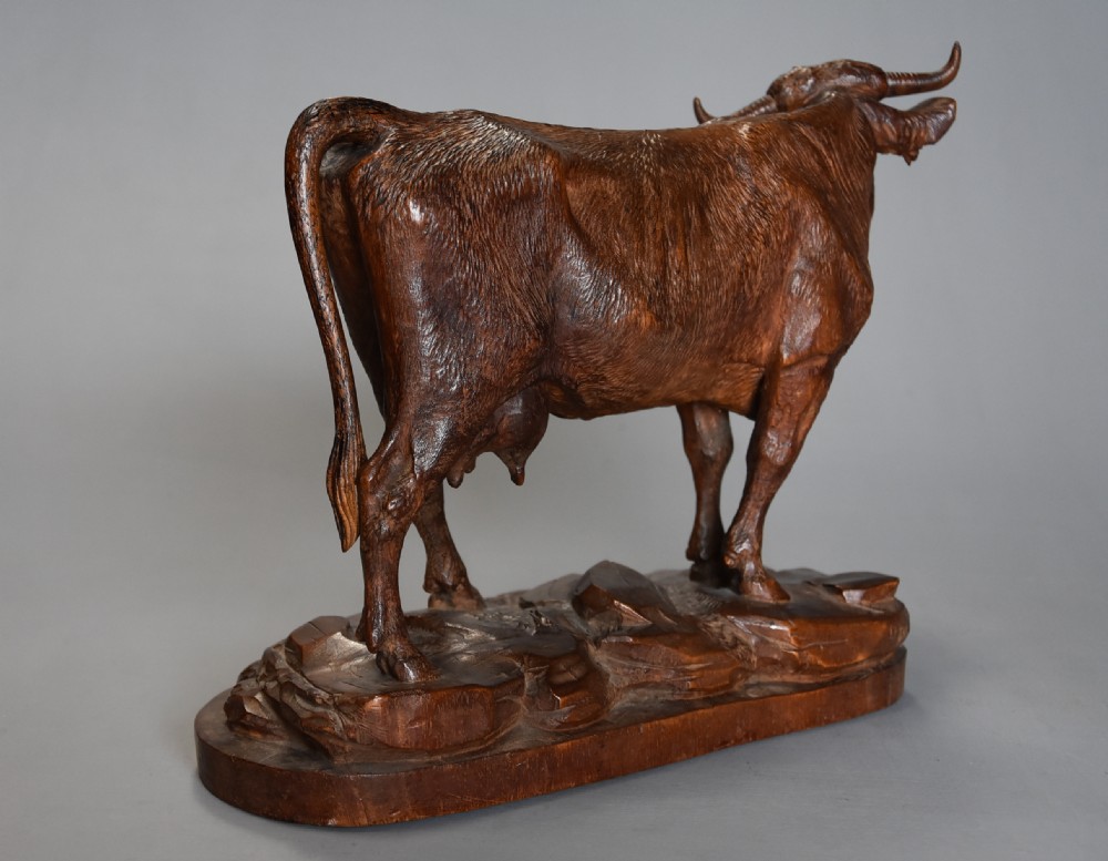 Finely carved late 19thc linden wood Black Forest cow, possibly by The Huggler family View X