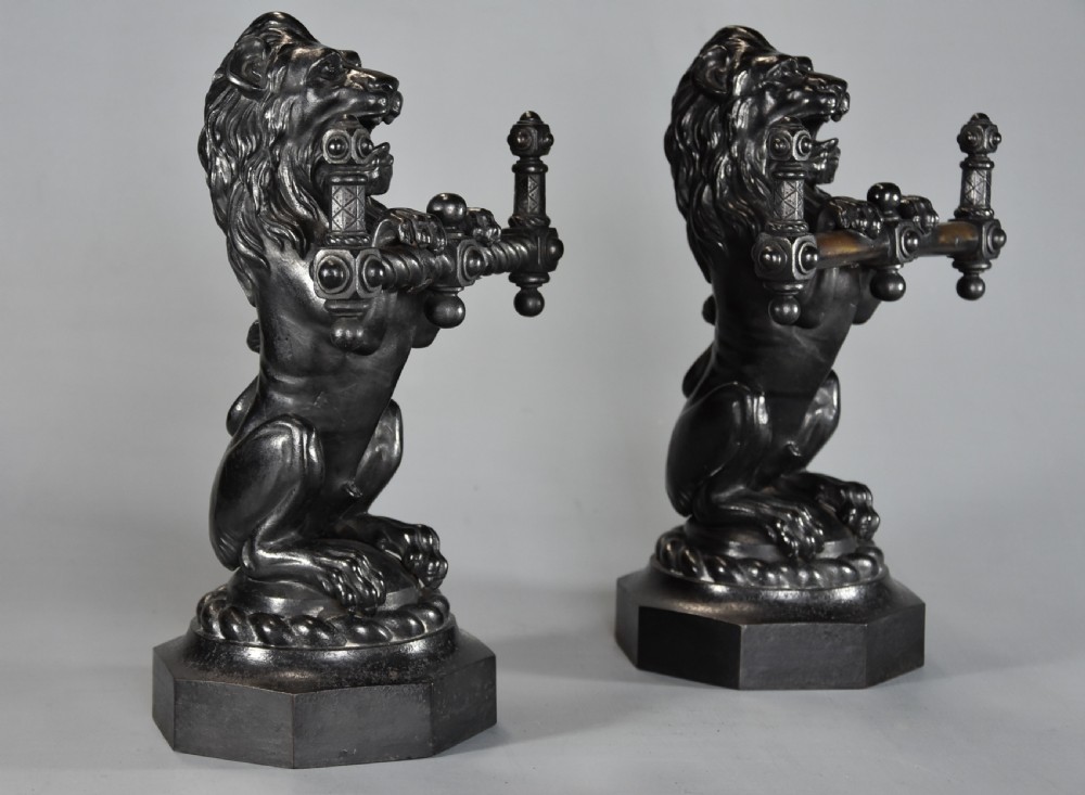 Pair of fine quality late 19th century cast iron fire dogs in the form of lions View II