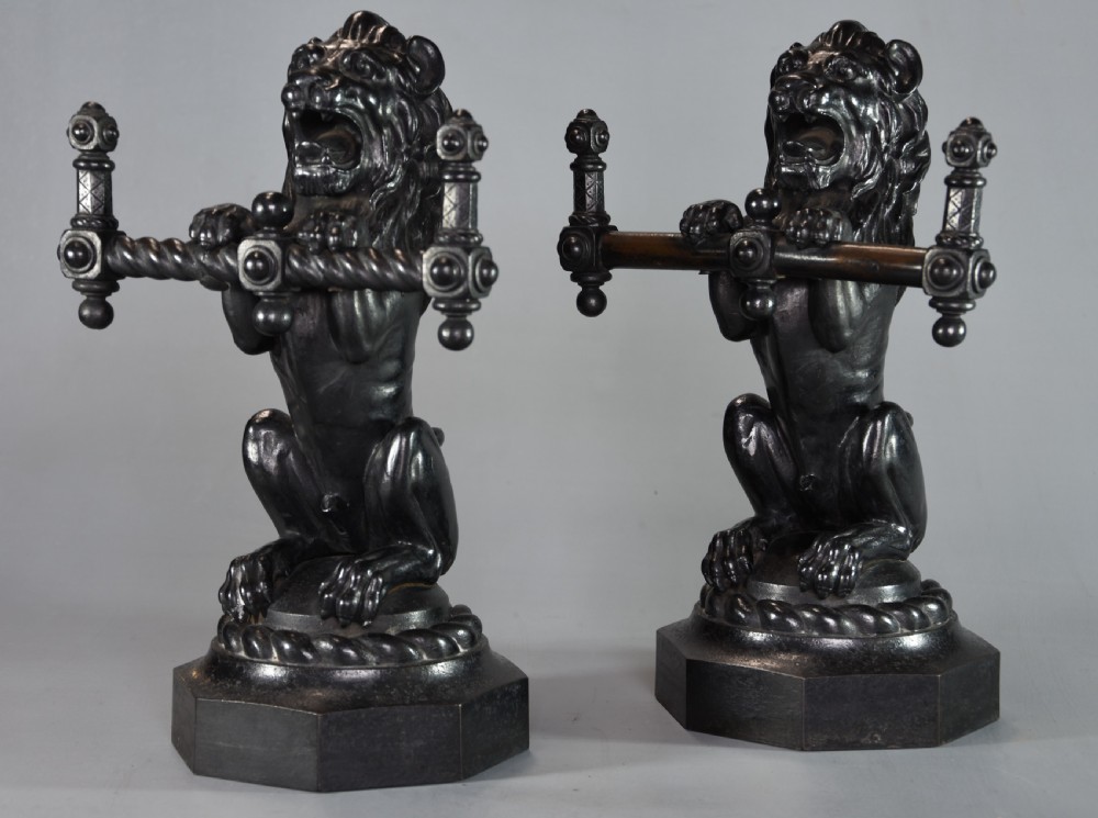 Pair of fine quality late 19th century cast iron fire dogs in the form of lions View III
