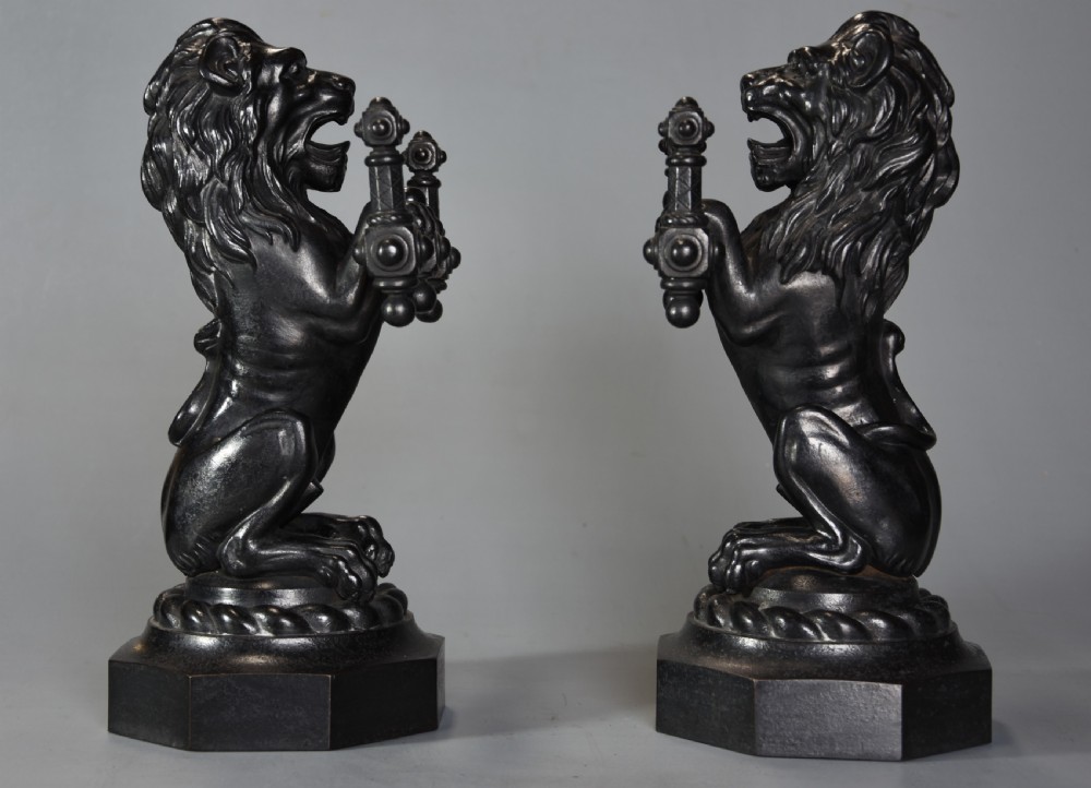 Pair of fine quality late 19th century cast iron fire dogs in the form of lions View V