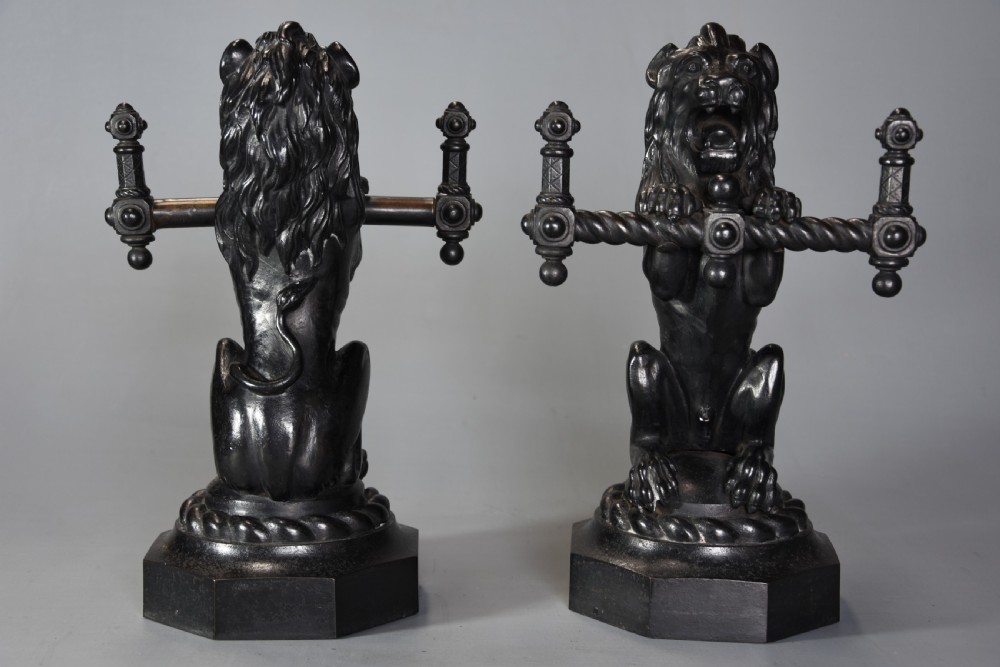 Pair of fine quality late 19th century cast iron fire dogs in the form of lions View VII