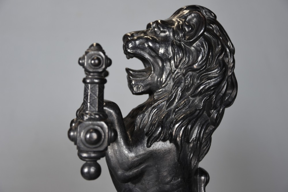 Pair of fine quality late 19th century cast iron fire dogs in the form of lions View VIII