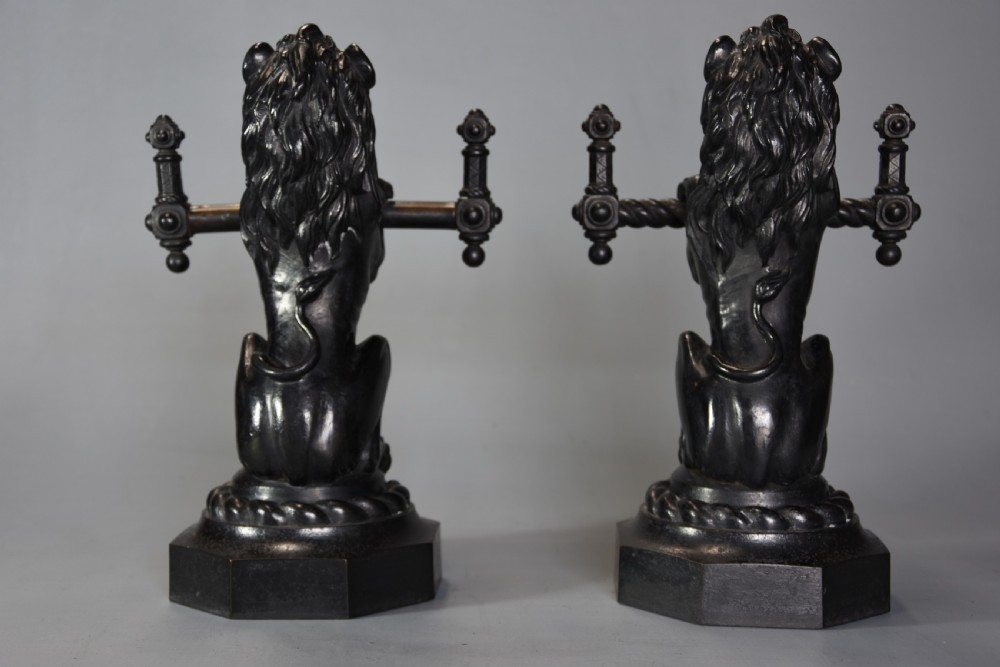 Pair of fine quality late 19th century cast iron fire dogs in the form of lions View X