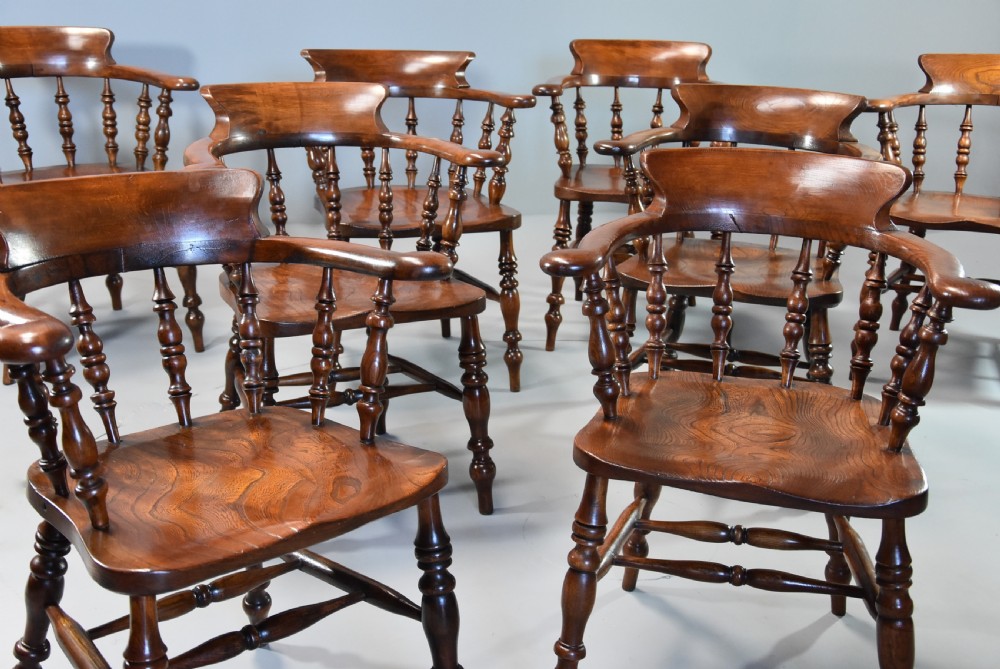 Large set of eight mid 19th century Smokers bow Windsor chairs or office chairs. View III