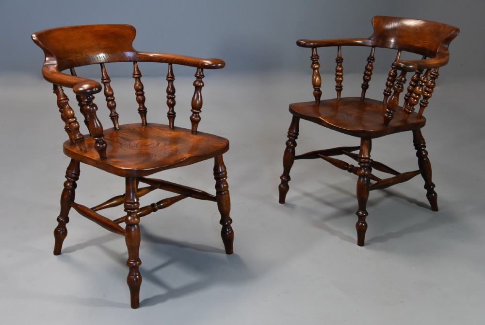 Large set of eight mid 19th century Smokers bow Windsor chairs or office chairs. View IV