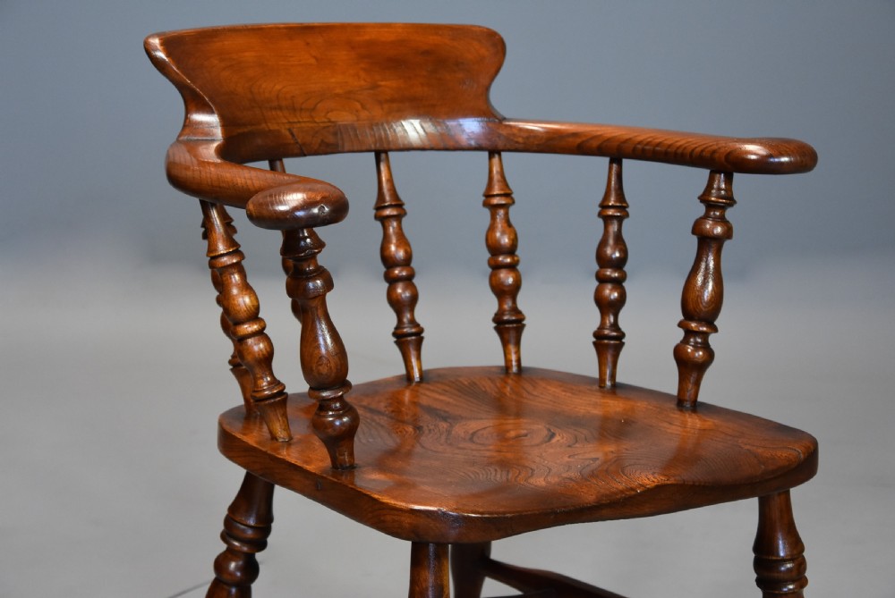 Large set of eight mid 19th century Smokers bow Windsor chairs or office chairs. View V