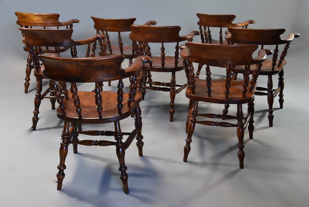 Large set of eight mid 19th century Smokers bow Windsor chairs or office chairs. View X