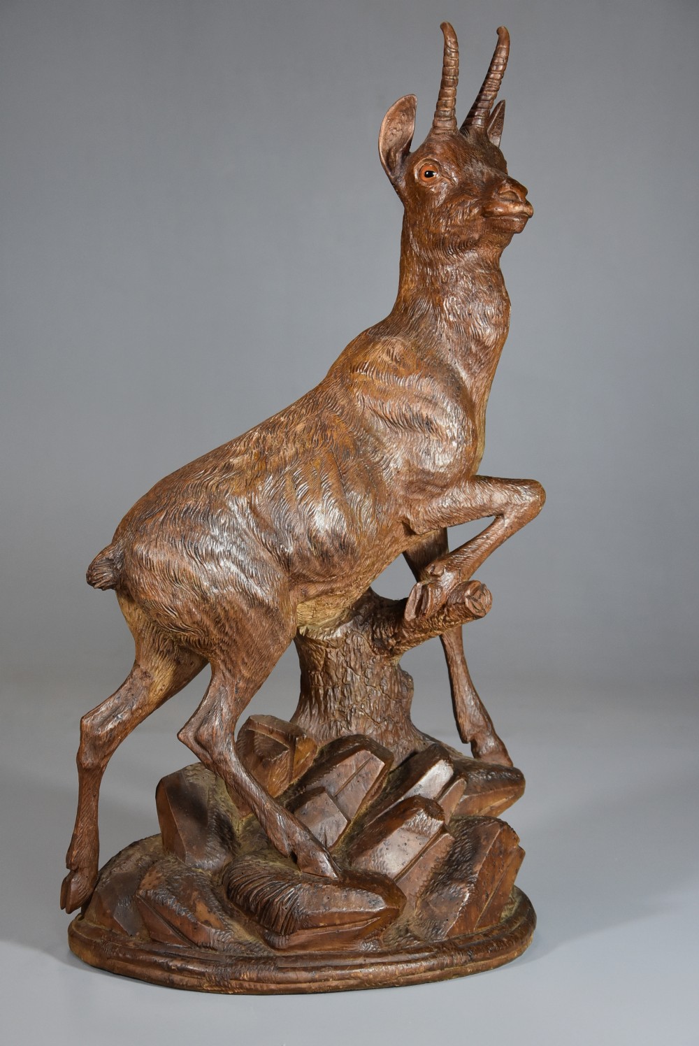 Late 19th century Black Forest finely carved linden wood figure of a chamois