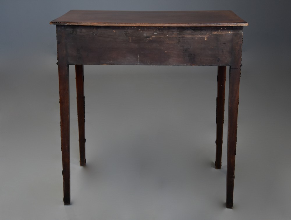 Highly decorative late 18th century mahogany side table with later applied brass paterae View XIII