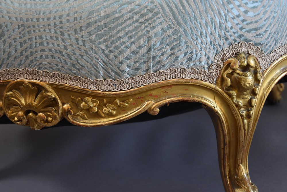 Large highly decorative 19th century French circular giltwood footstool in the Rococo style View IX
