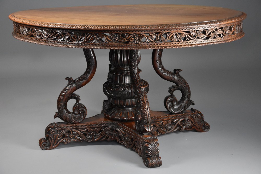 Mid 19th century Anglo Indian padouk oval centre table with superb faded patina View II