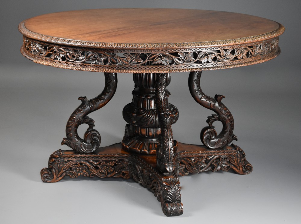 Mid 19th century Anglo Indian padouk oval centre table with superb faded patina View IV
