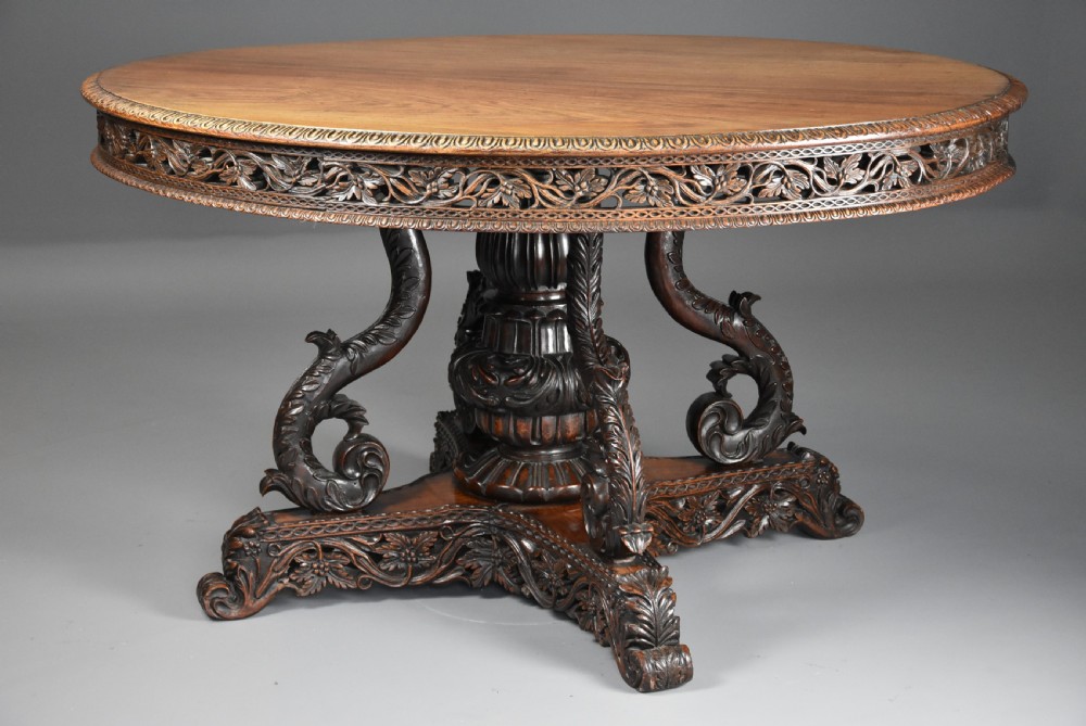 Mid 19th century Anglo Indian padouk oval centre table with superb faded patina View V