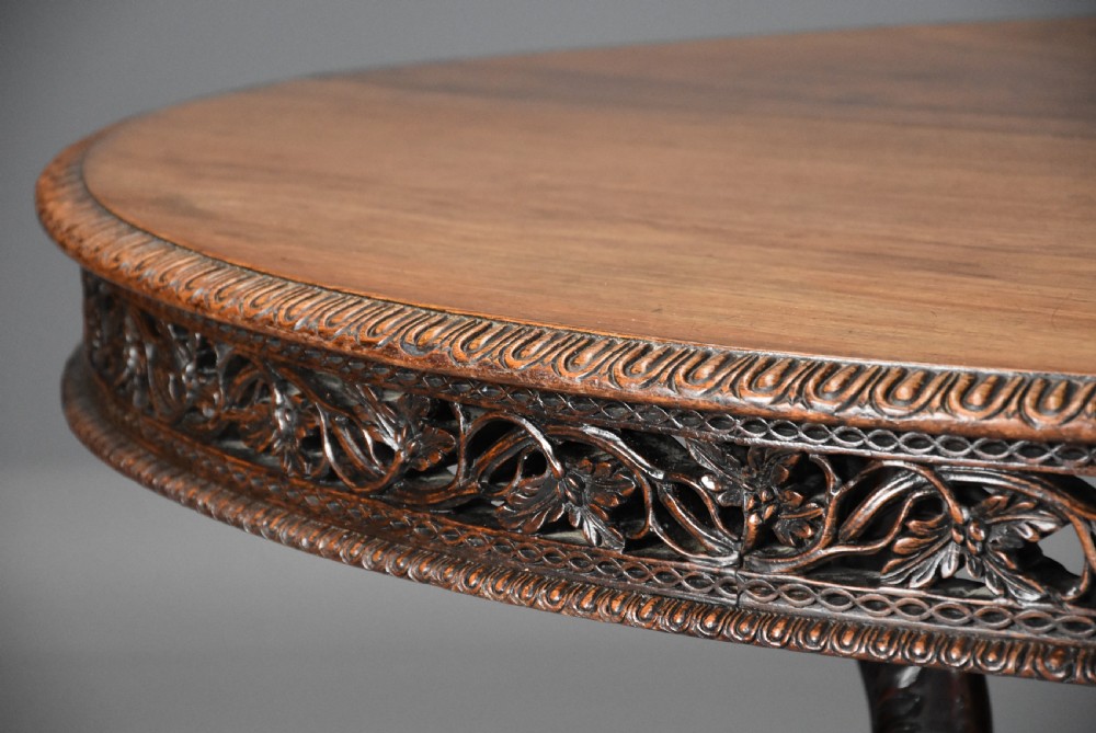 Mid 19th century Anglo Indian padouk oval centre table with superb faded patina View VI