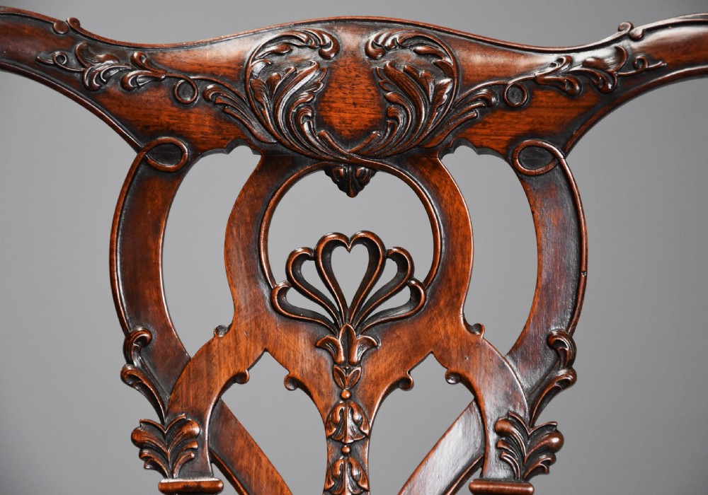Superb quality large set of twenty one late 19thc Chippendale style mahogany dining chairs of excellent patina View VI