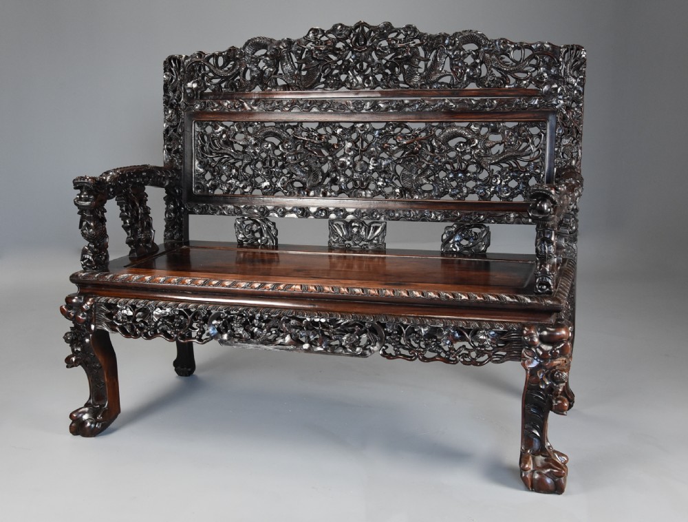 Superb quality late 19th century Chinese profusely carved padouk seven piece suite View VI