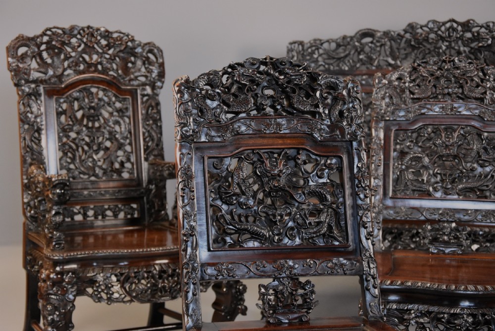 Superb quality late 19th century Chinese profusely carved padouk seven piece suite View XV