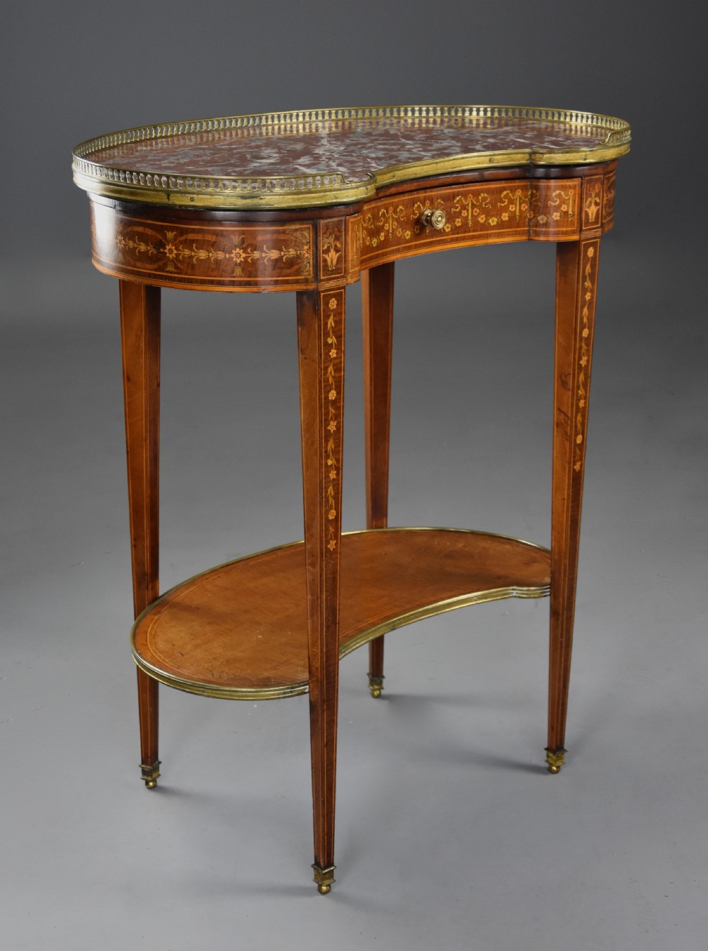 Fine quality 19thc two tier kidney shaped mahogany & satinwood marble top occasional table in the manner of Edwards & Roberts View IV