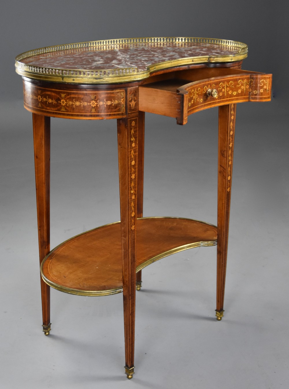 Fine quality 19thc two tier kidney shaped mahogany & satinwood marble top occasional table in the manner of Edwards & Roberts View V