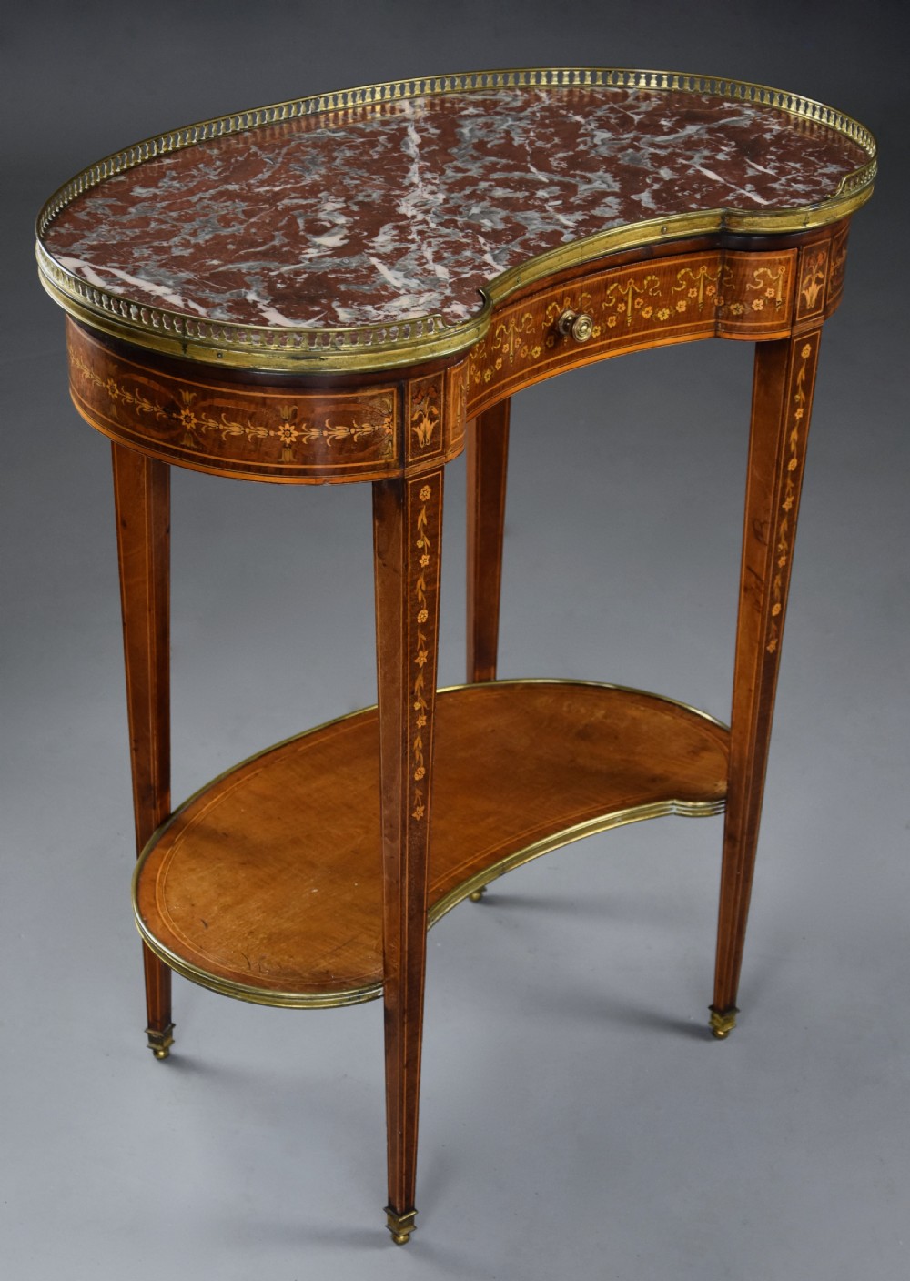 Fine quality 19thc two tier kidney shaped mahogany & satinwood marble top occasional table in the manner of Edwards & Roberts View VI