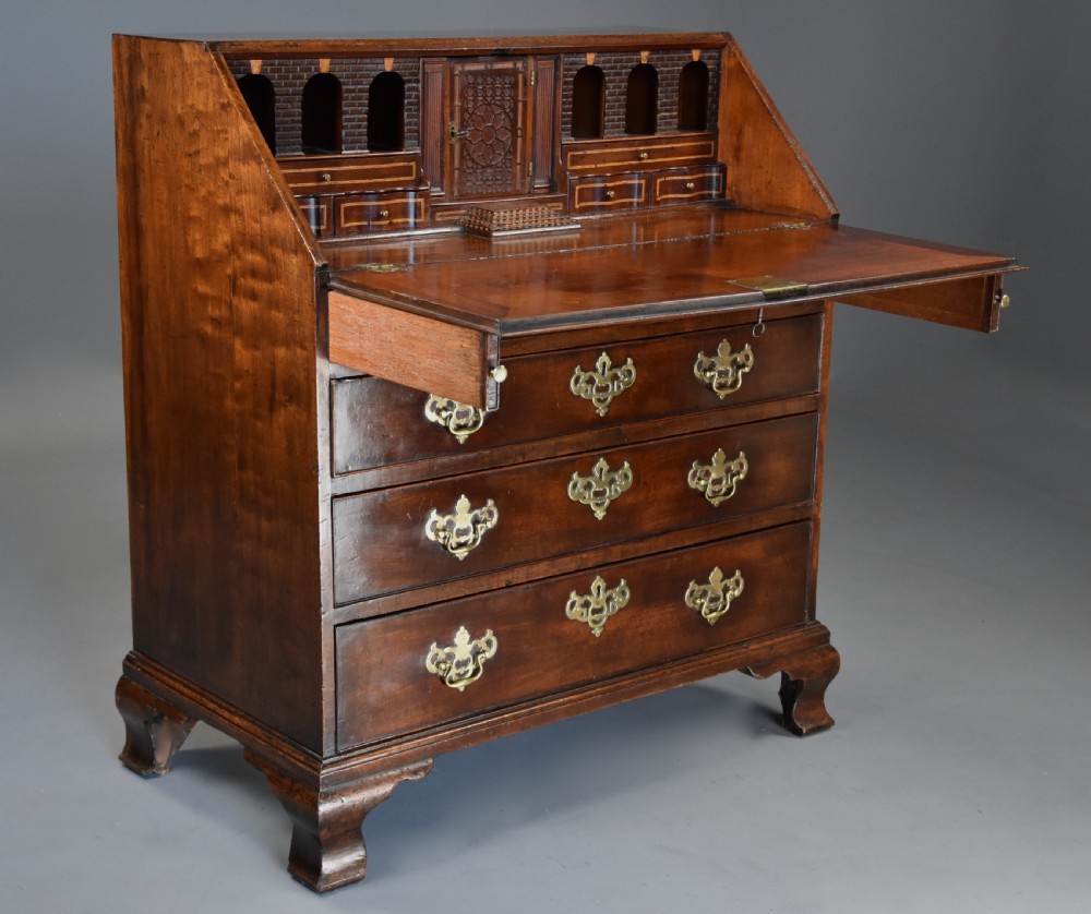 Mid-late 18thc mahogany bureau supported on ogee feet of fine patina with superb interior