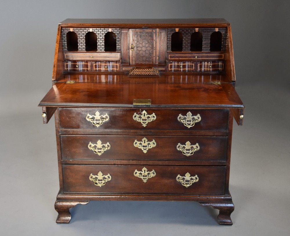 Mid-late 18thc mahogany bureau supported on ogee feet of fine patina with superb interior View IV