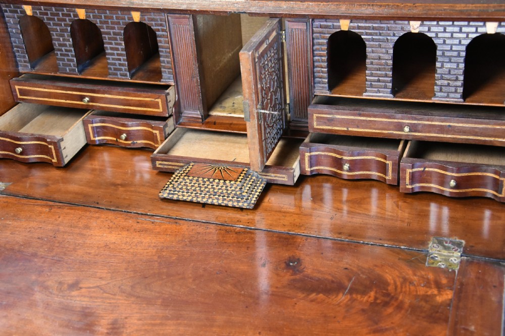 Mid-late 18thc mahogany bureau supported on ogee feet of fine patina with superb interior View VII
