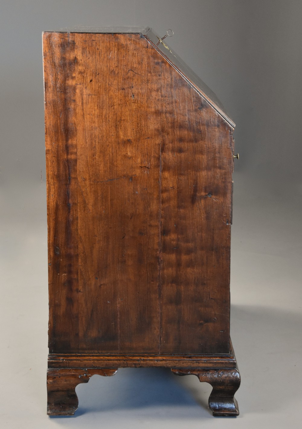 Mid-late 18thc mahogany bureau supported on ogee feet of fine patina with superb interior View IX