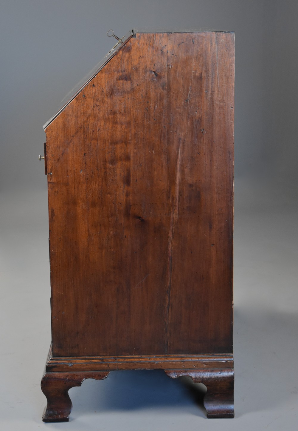 Mid-late 18thc mahogany bureau supported on ogee feet of fine patina with superb interior View X