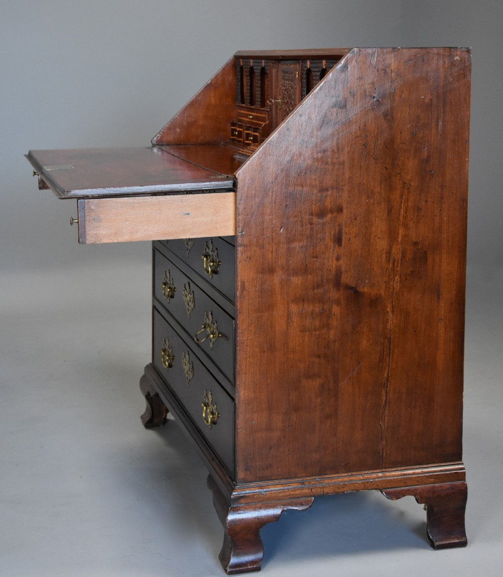 Mid-late 18thc mahogany bureau supported on ogee feet of fine patina with superb interior View XI