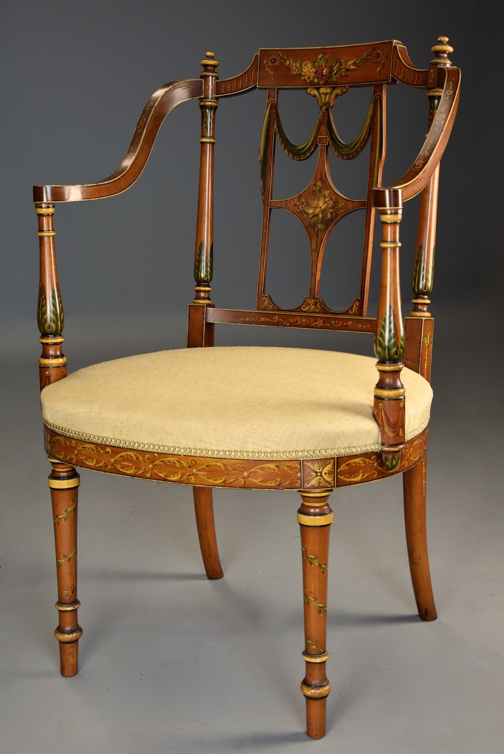 Fine quality early 20th century Sheraton revival satinwood & painted open armchair
